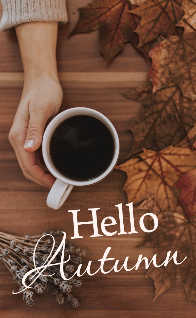 Hello Autumn picture with a hot drink on a beautiful fall background (tall rectangle shape picture)